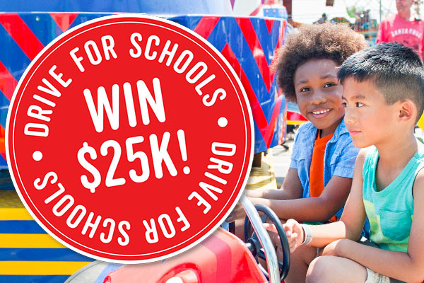 children on ride at Boardwalk - Win $25k, Drive for Schools